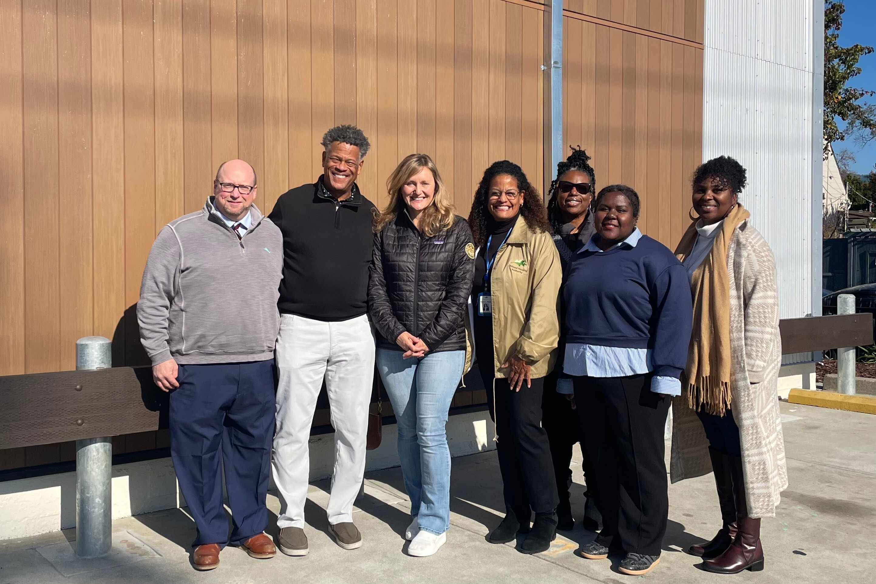 Assemblywoman Buffy Wicks stands with OHA leadership and Lighthouse Public Affairs staff during OHA tour.