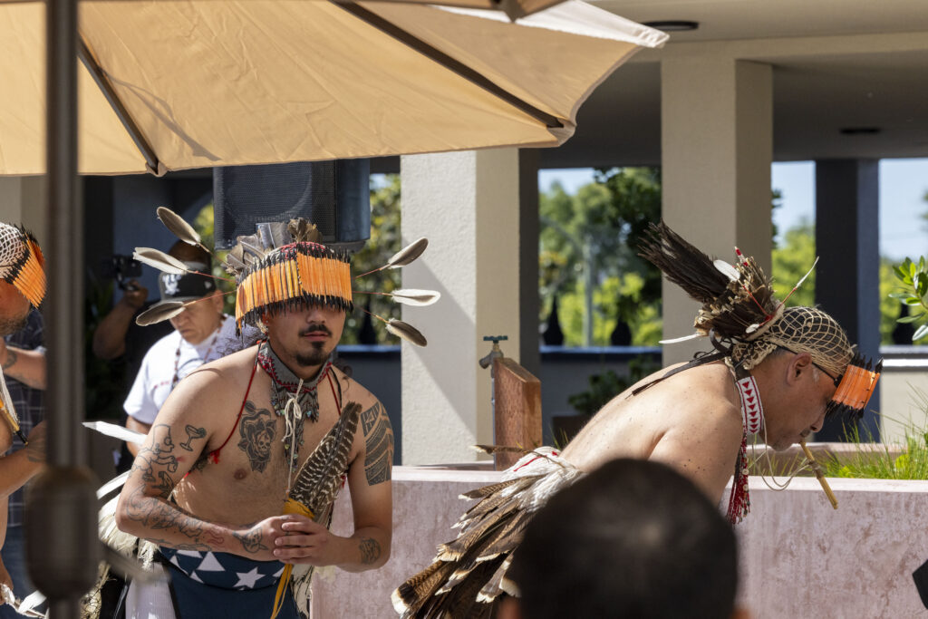 Cultural performers participate in a dance performance during the grand opening celebration for Flicker & Flicker Bird Homes in Oakland.